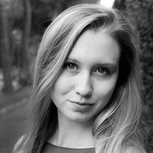 Black and White portrait of a young woman with long hair. 