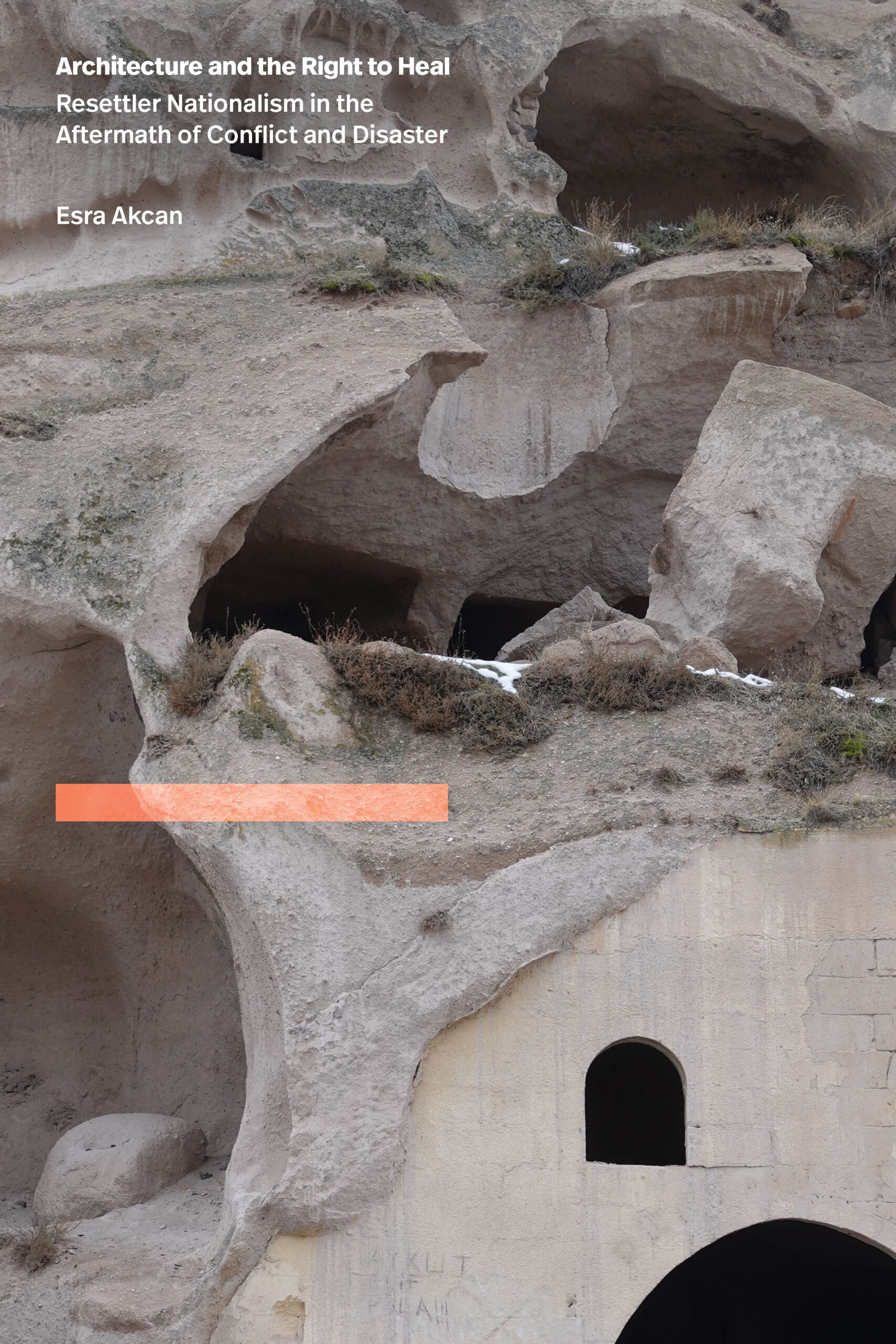 Book cover of a natural rock face with a manmade window inside it
