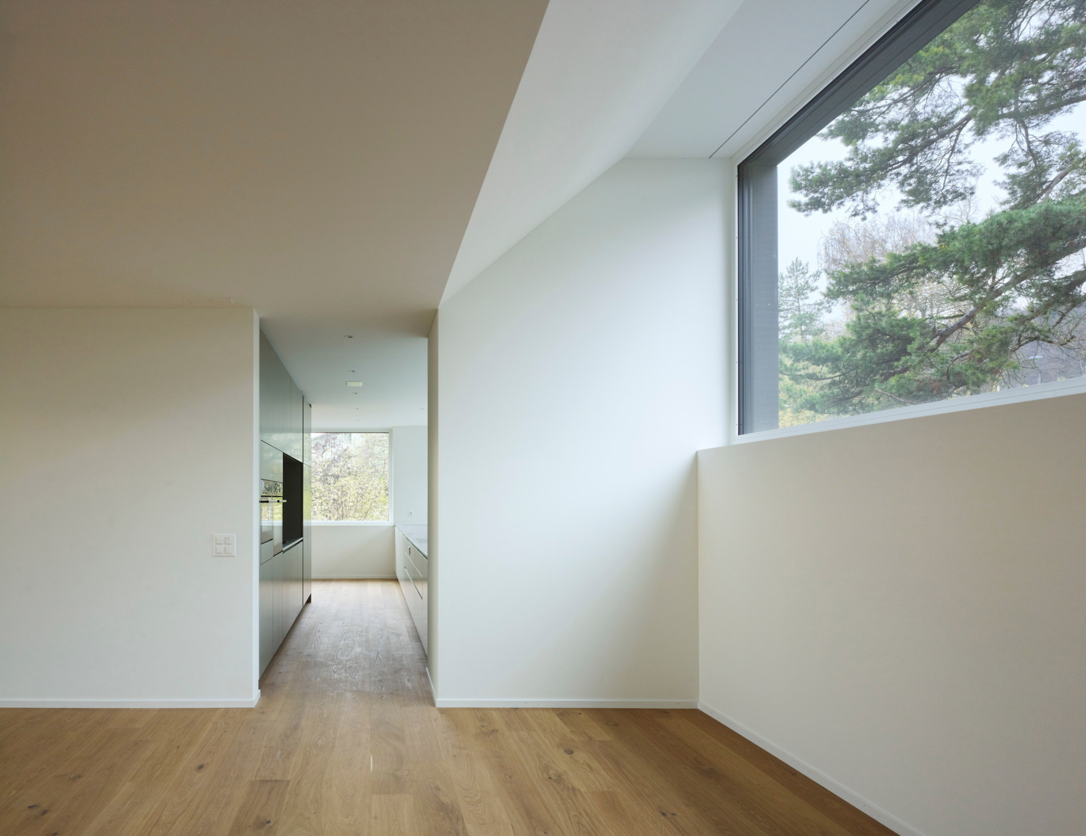 White walled room with a large picture window