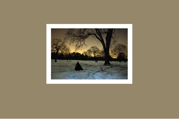 Beige book cover with a photograph of a winter sunset centered on the cover
