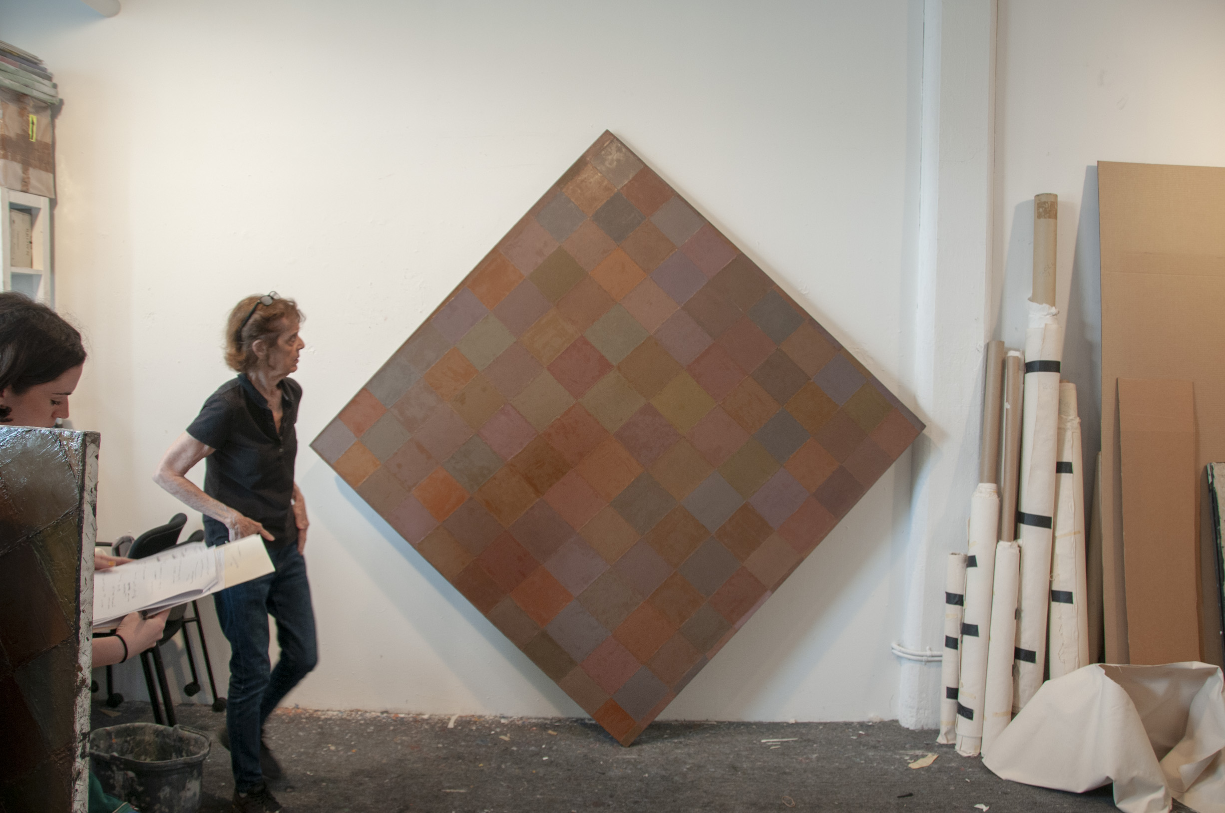 Pat Lipsky with assistant and painting Tryst in her studio, 2020.