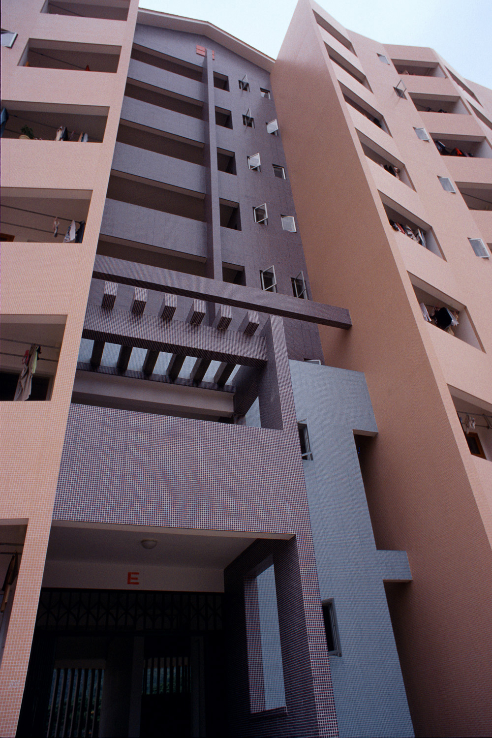 Exterior view of entry into eight-story dormitory.