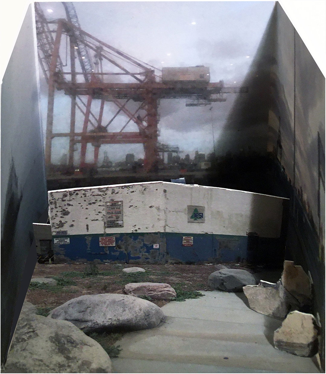 Digitally printed artist’s book showing an old building and metal beams.