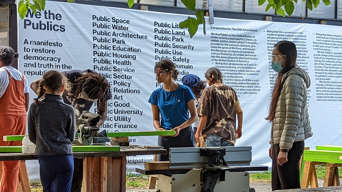 Students sawing 2x4s