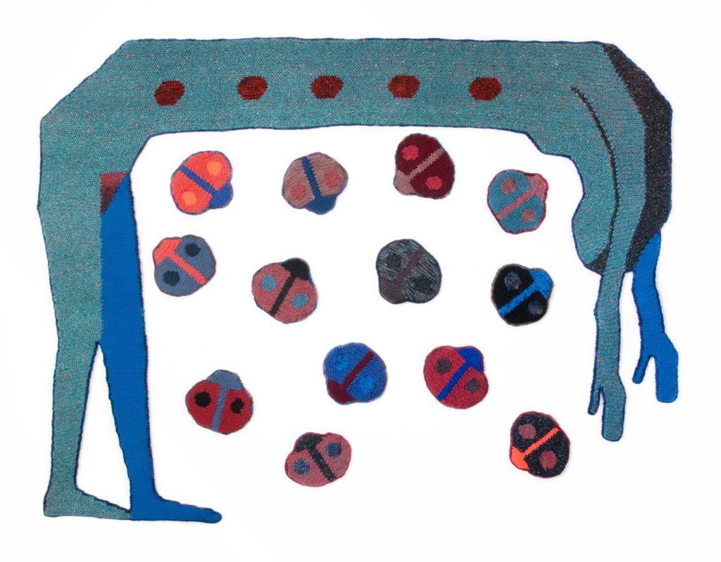 Blue crocheted figure leaning over 13 crocheted lady bugs