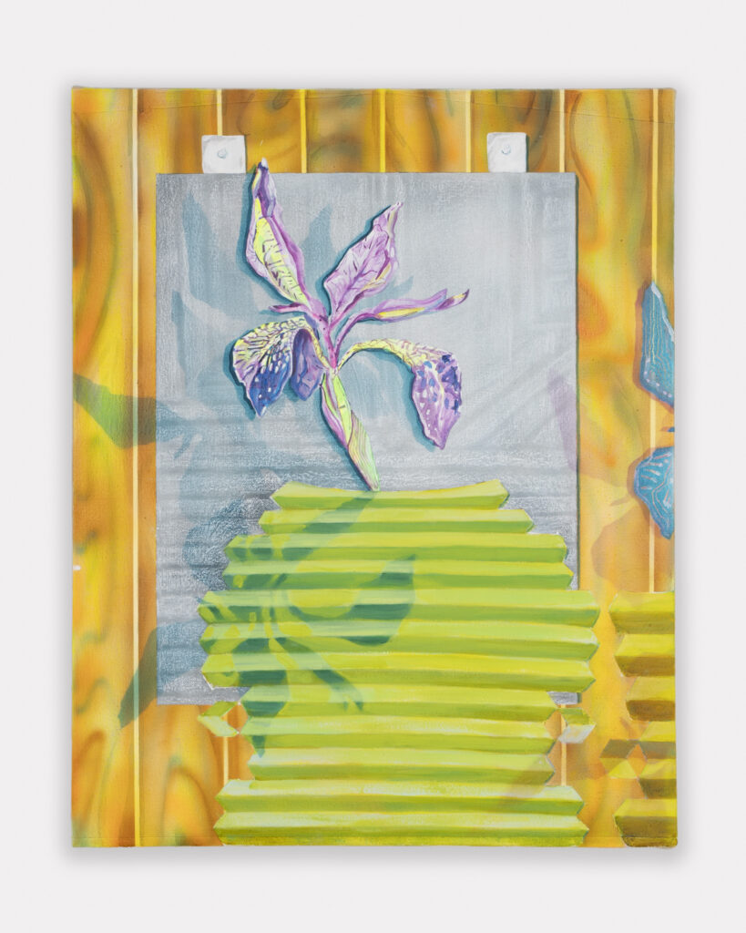 painting of a purple iris taped to a wood grained surface