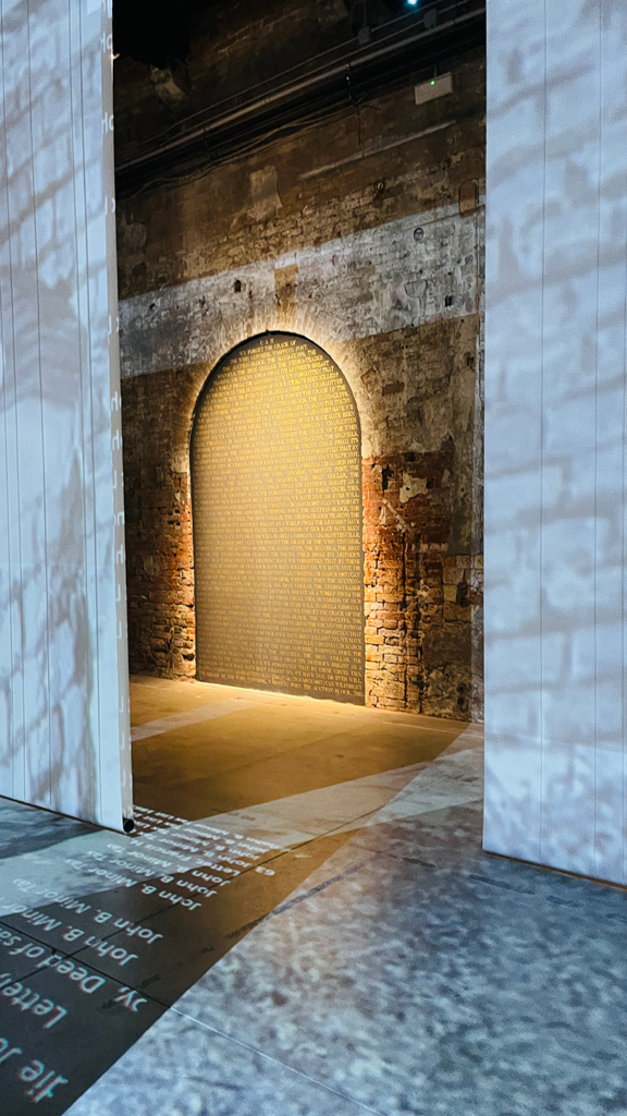 Installation featuring walls of projected text