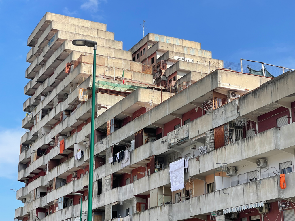 Large concrete public housing complex.