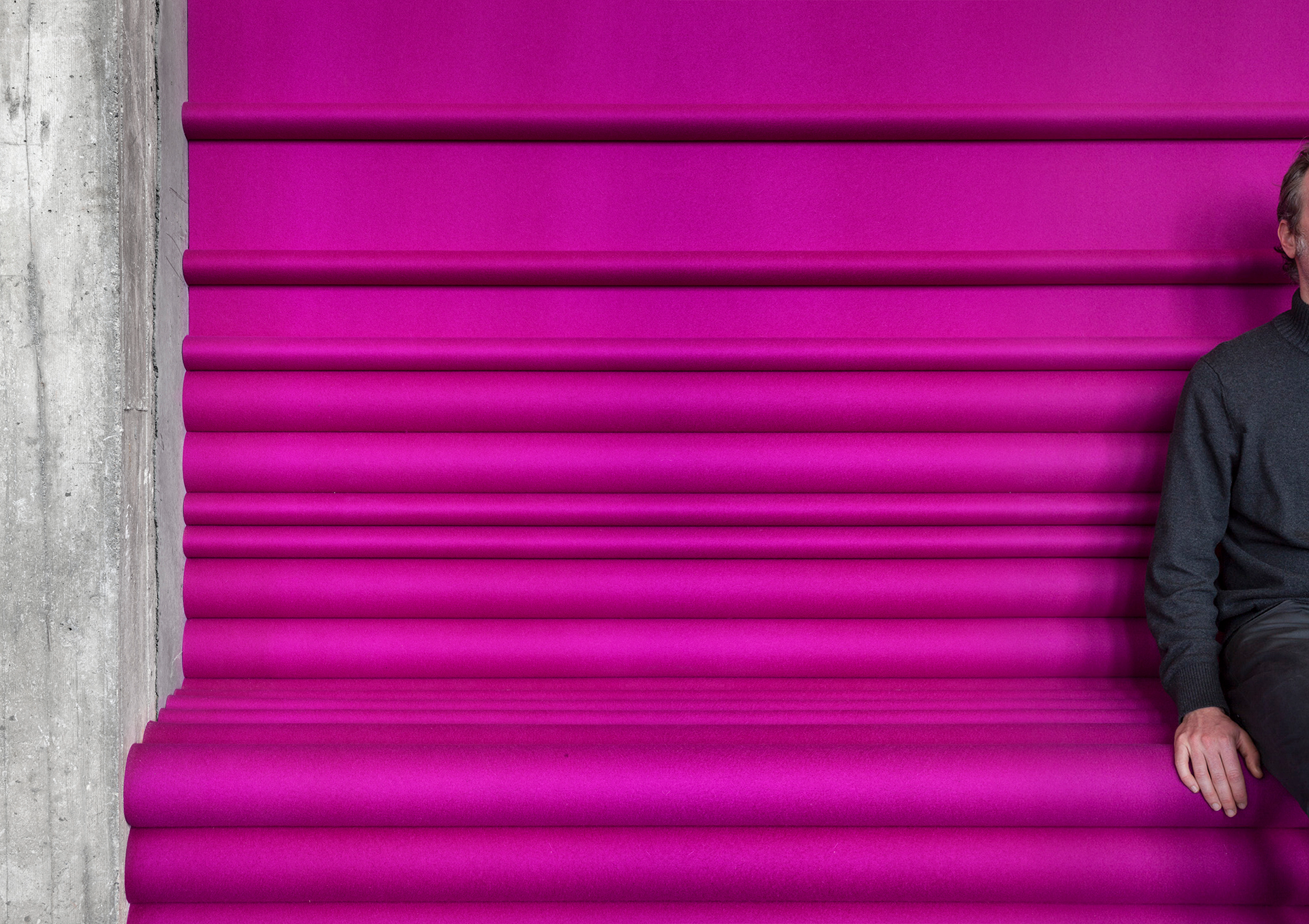 Bend seat covered in bright pink cloth