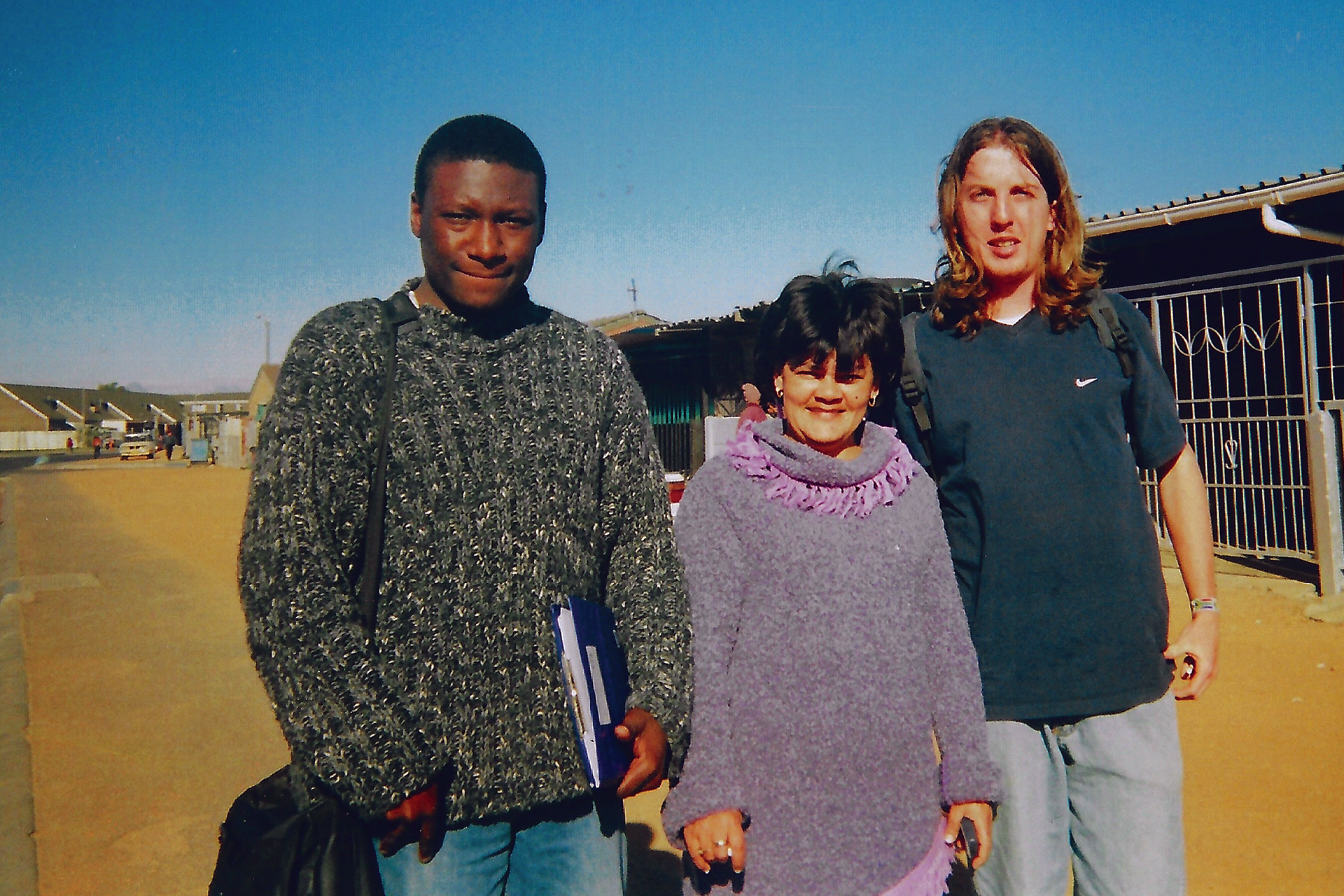 Students and community members posed in a South African street