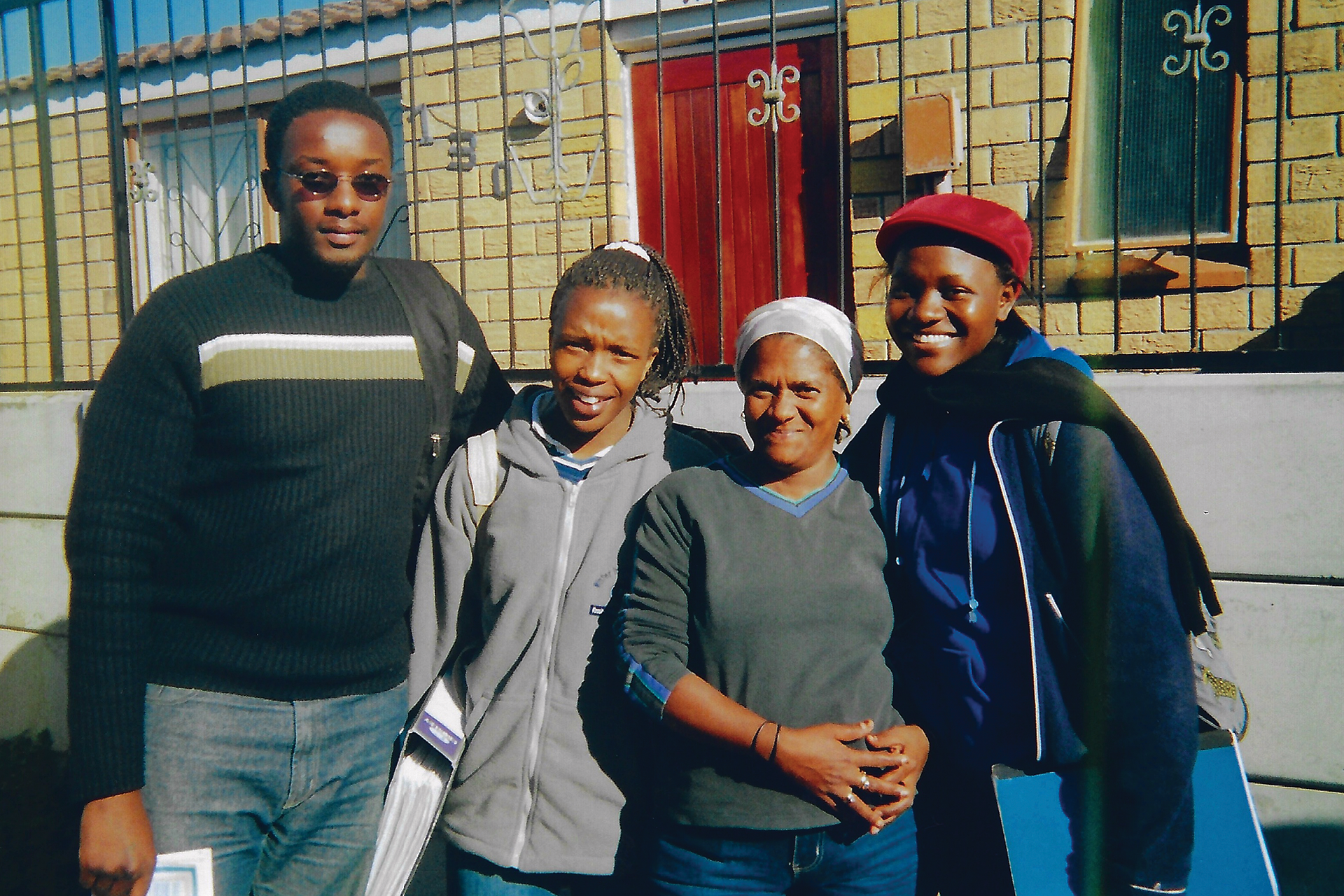 Students and community members posed in a South African street