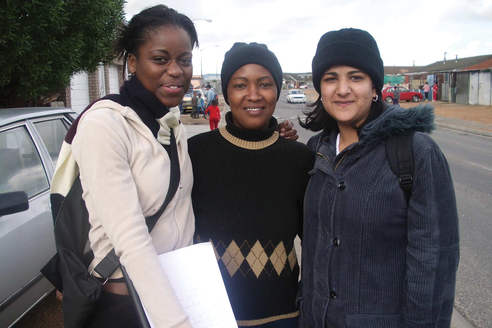Students and community members posed in a South African street