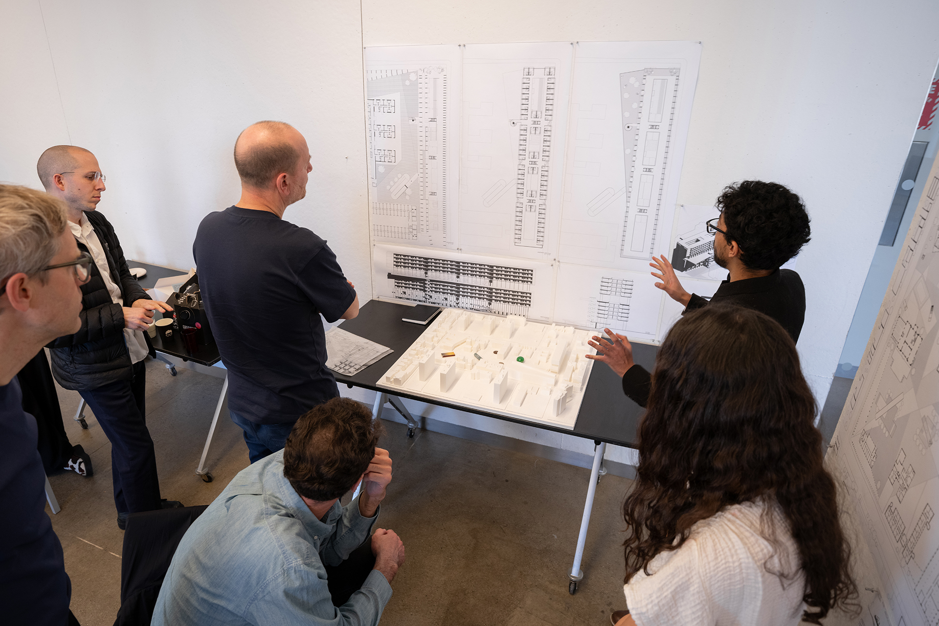 Student presenting work to a panel