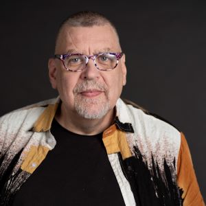 A person with purple glasses