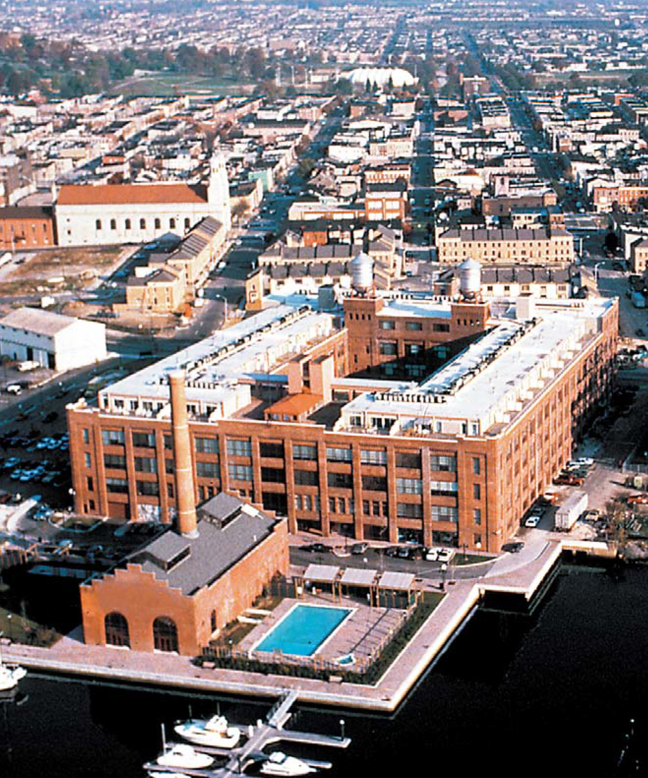 Large apartment building with a pool outside