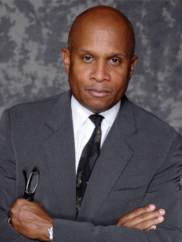 Chauncey Jones headshot, depicts man in a suit