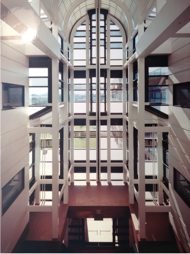 atrium of a big glass building with white interior