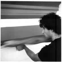 black and white headshot of a man's profile