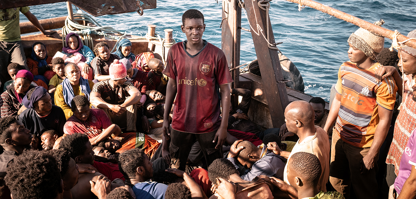 Image of migrants on a boat