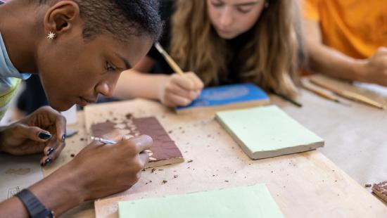 Students carving woodblocks
