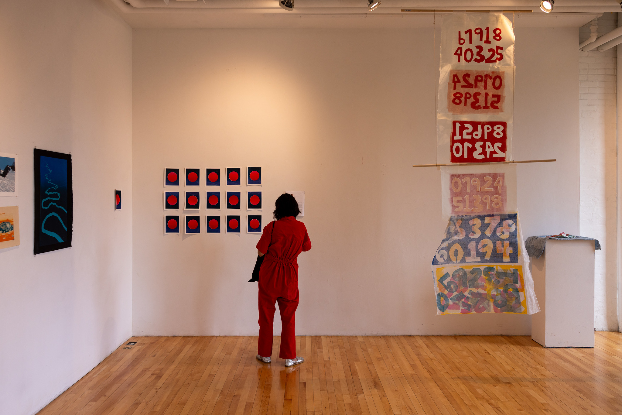 Person viewing a gallery exhibition