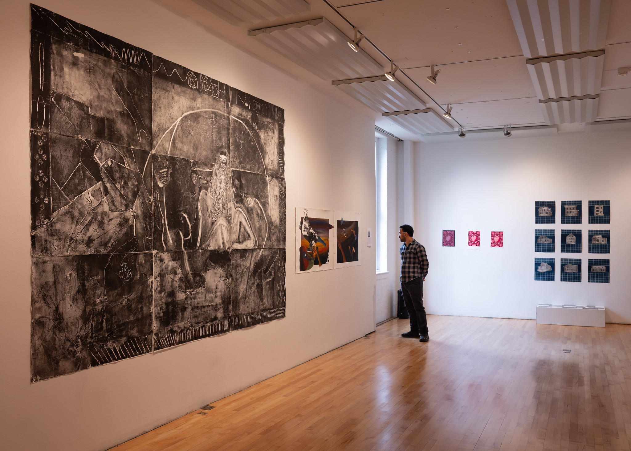 Man viewing art in a gallery space