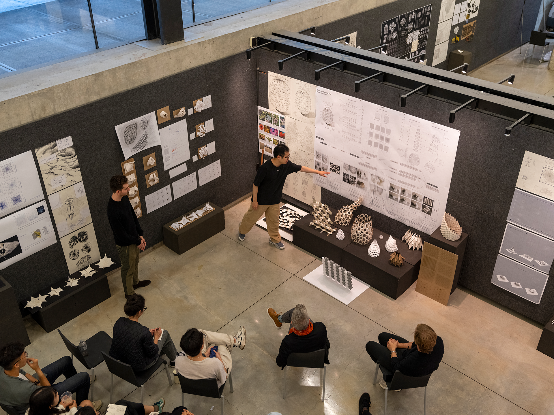 Student presenting work to a panel