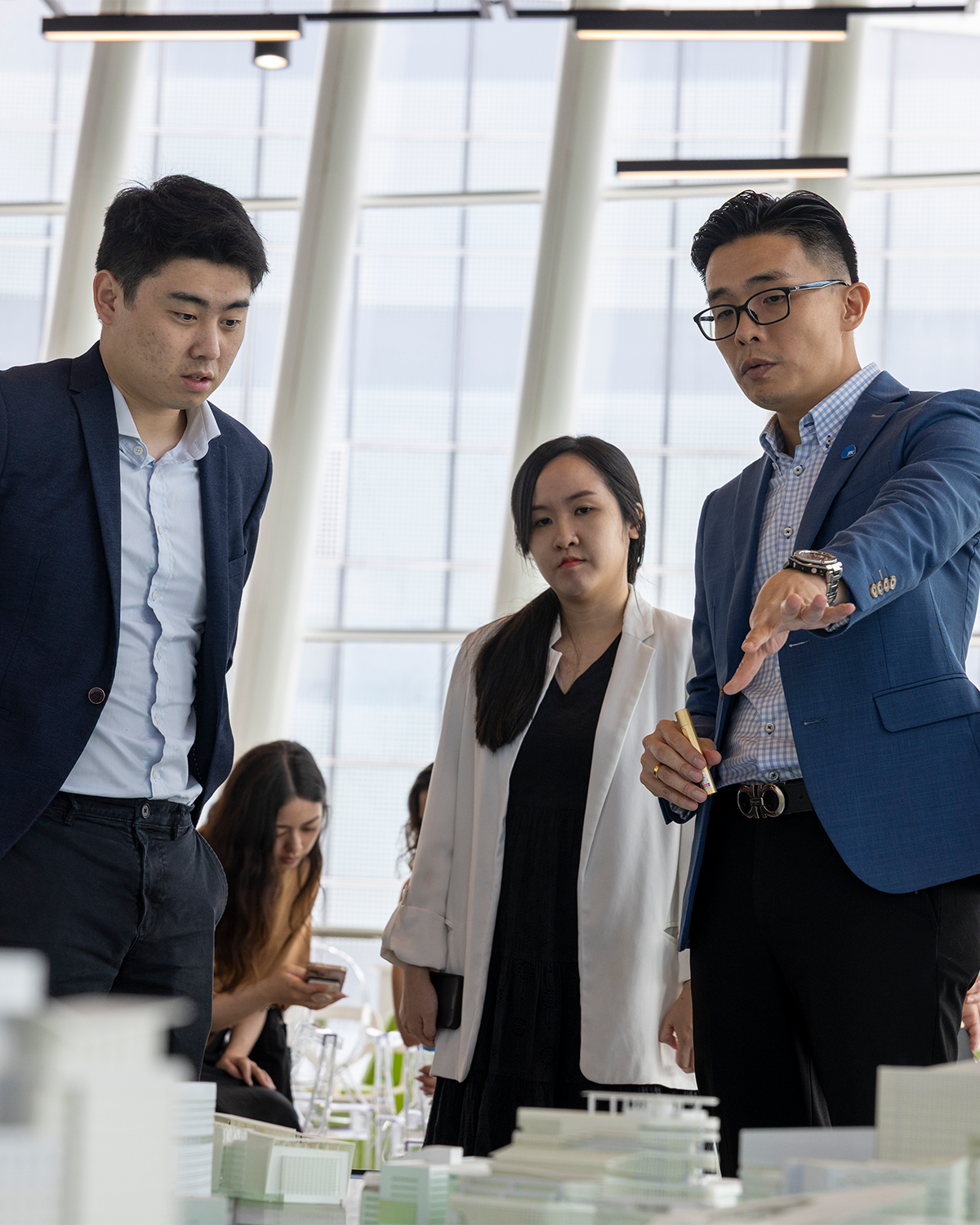 students discussing a model city