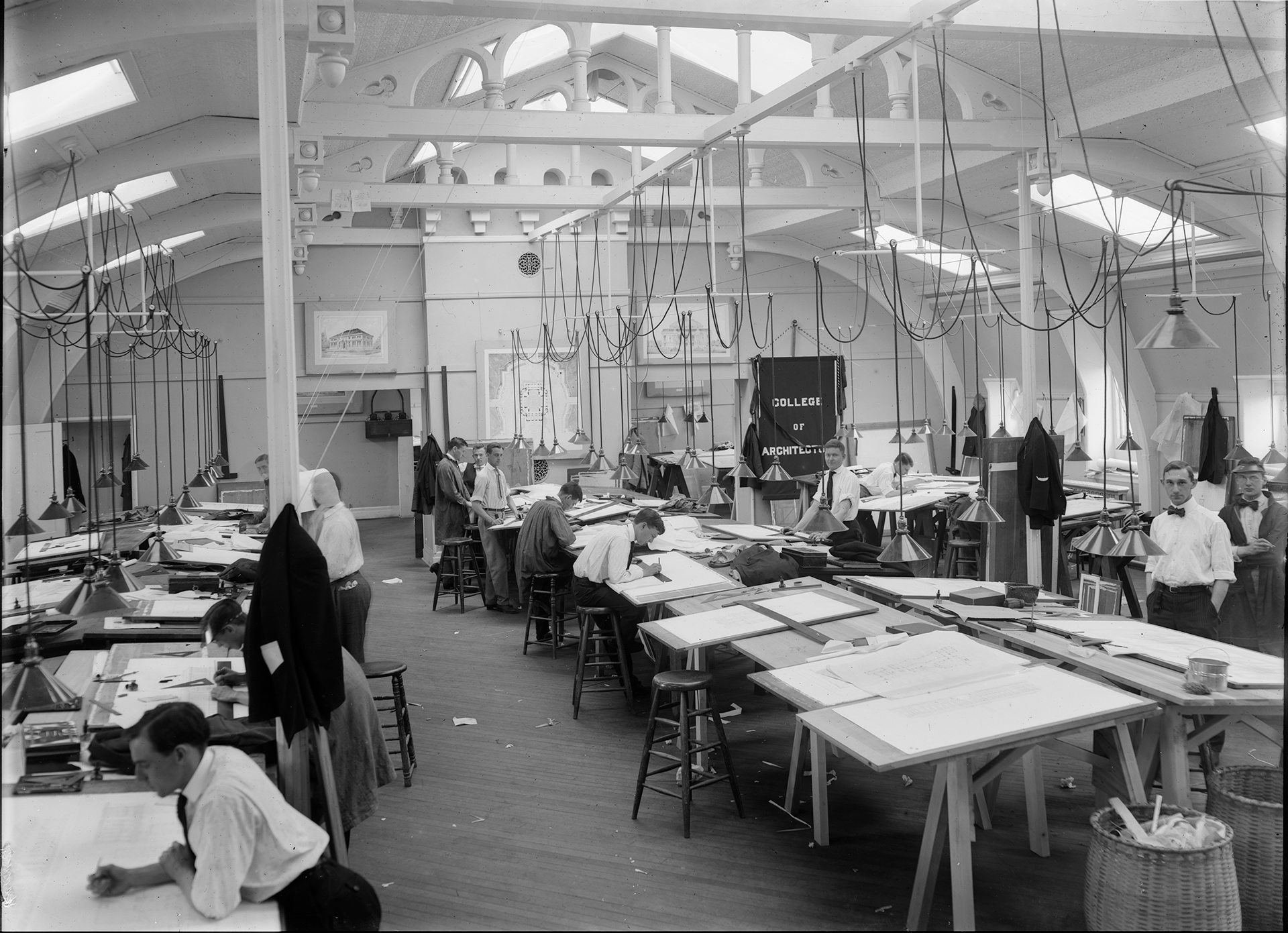 historic image of architecture students at their drawing tables