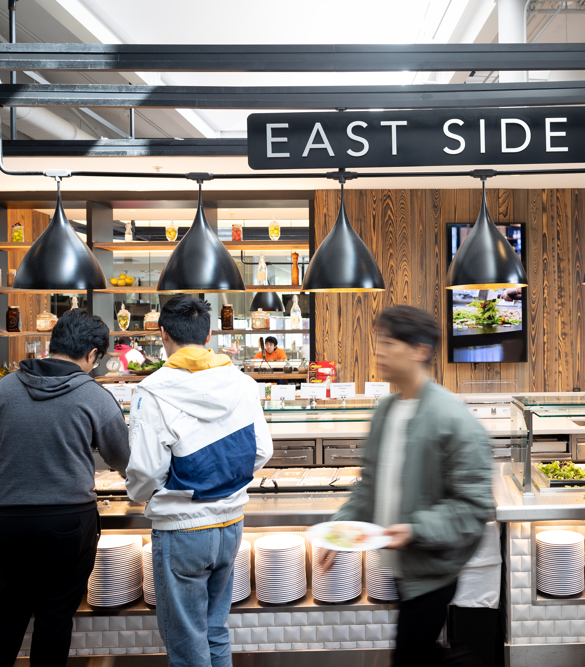 Students getting food in a dining hall
