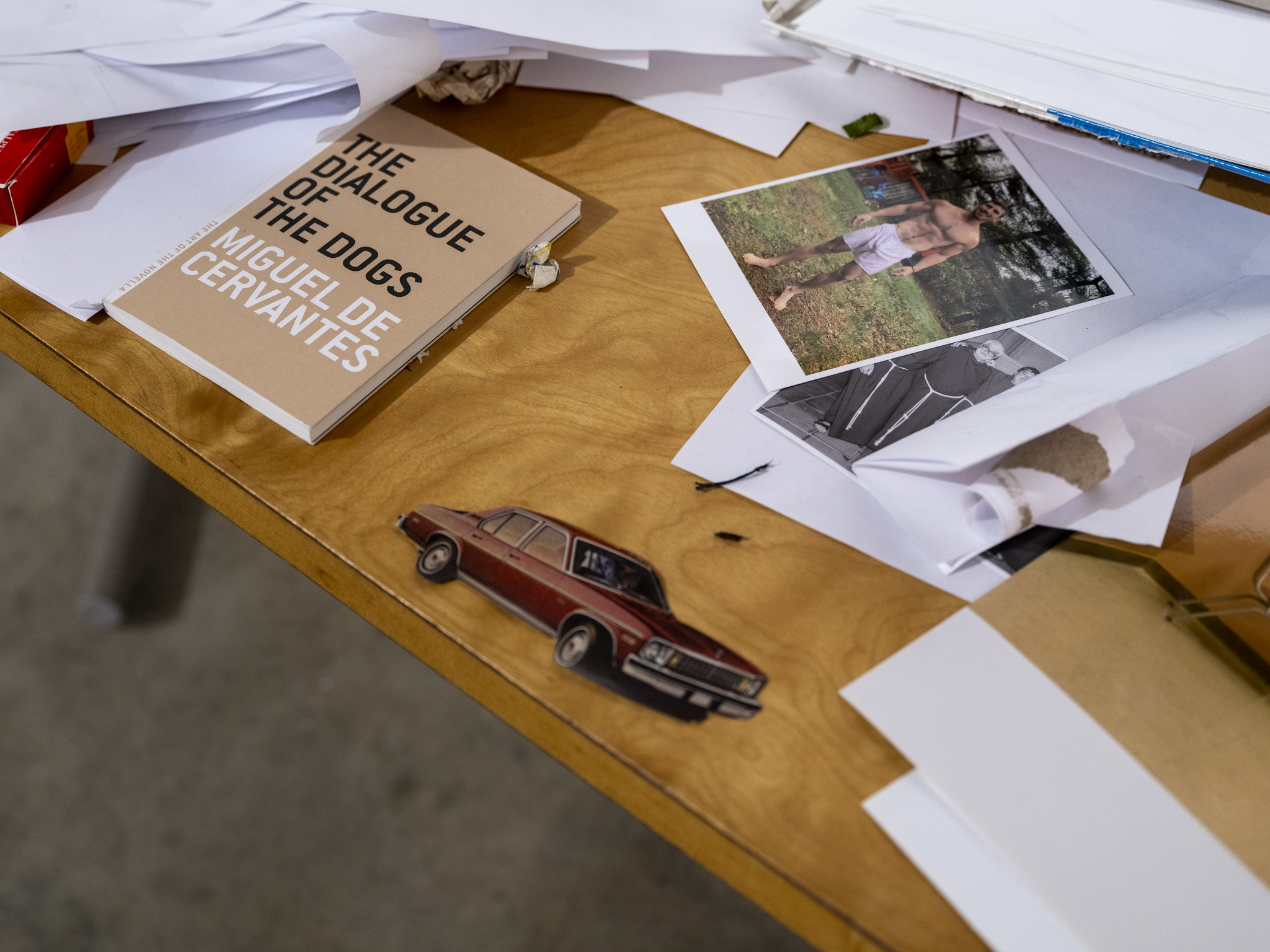 book and papers on a desk
