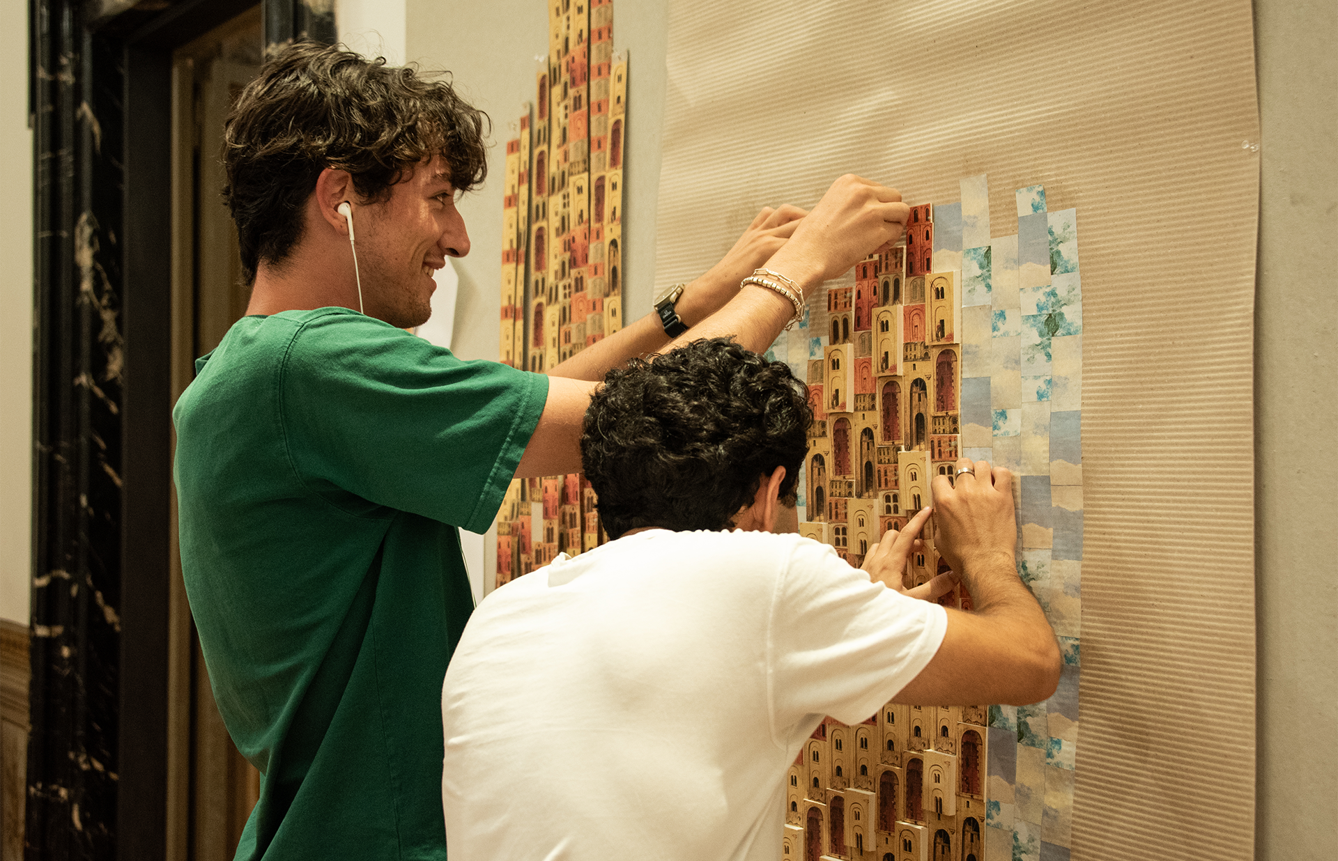 students pinning up work