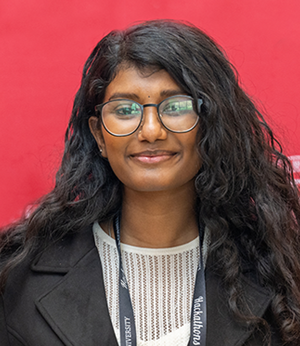 headshot of Premika Amudhan