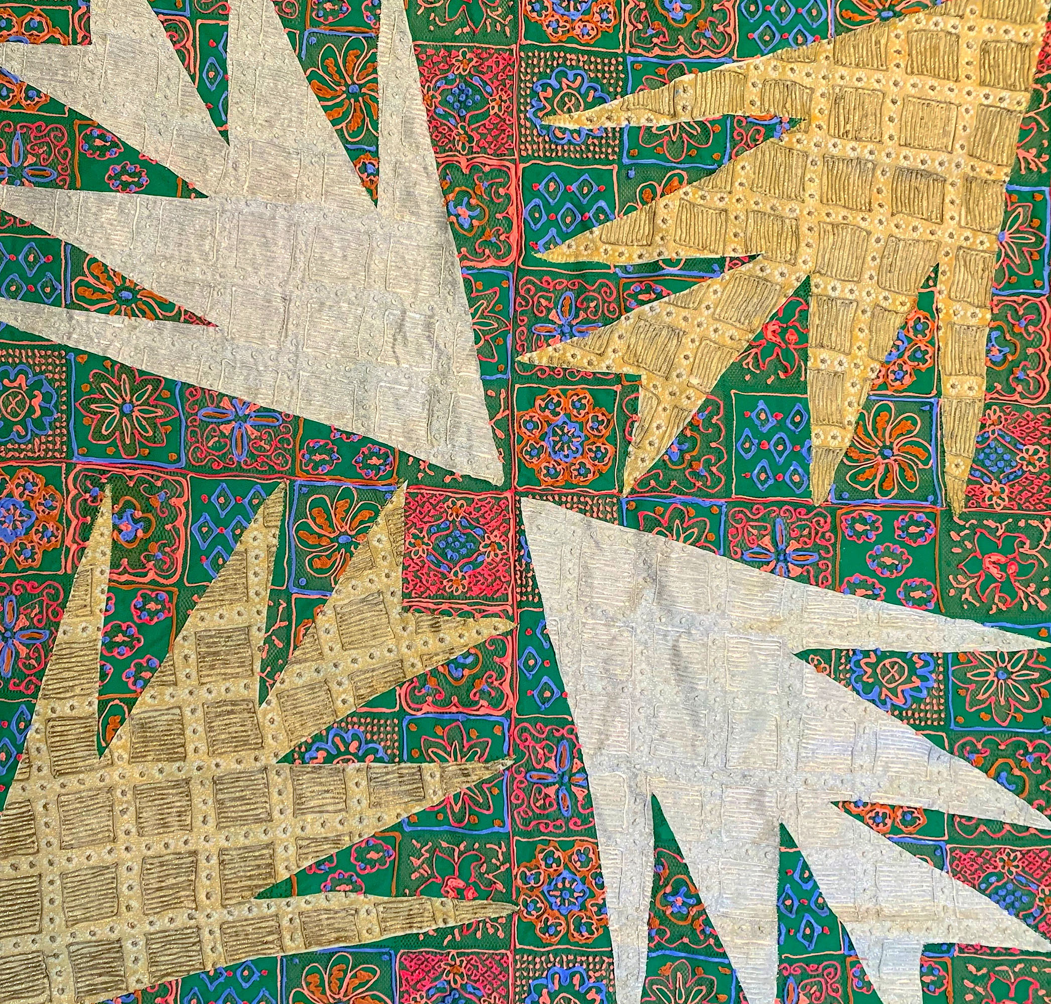 Neutral-colored leaf motifs over a colorful quilt-like background.