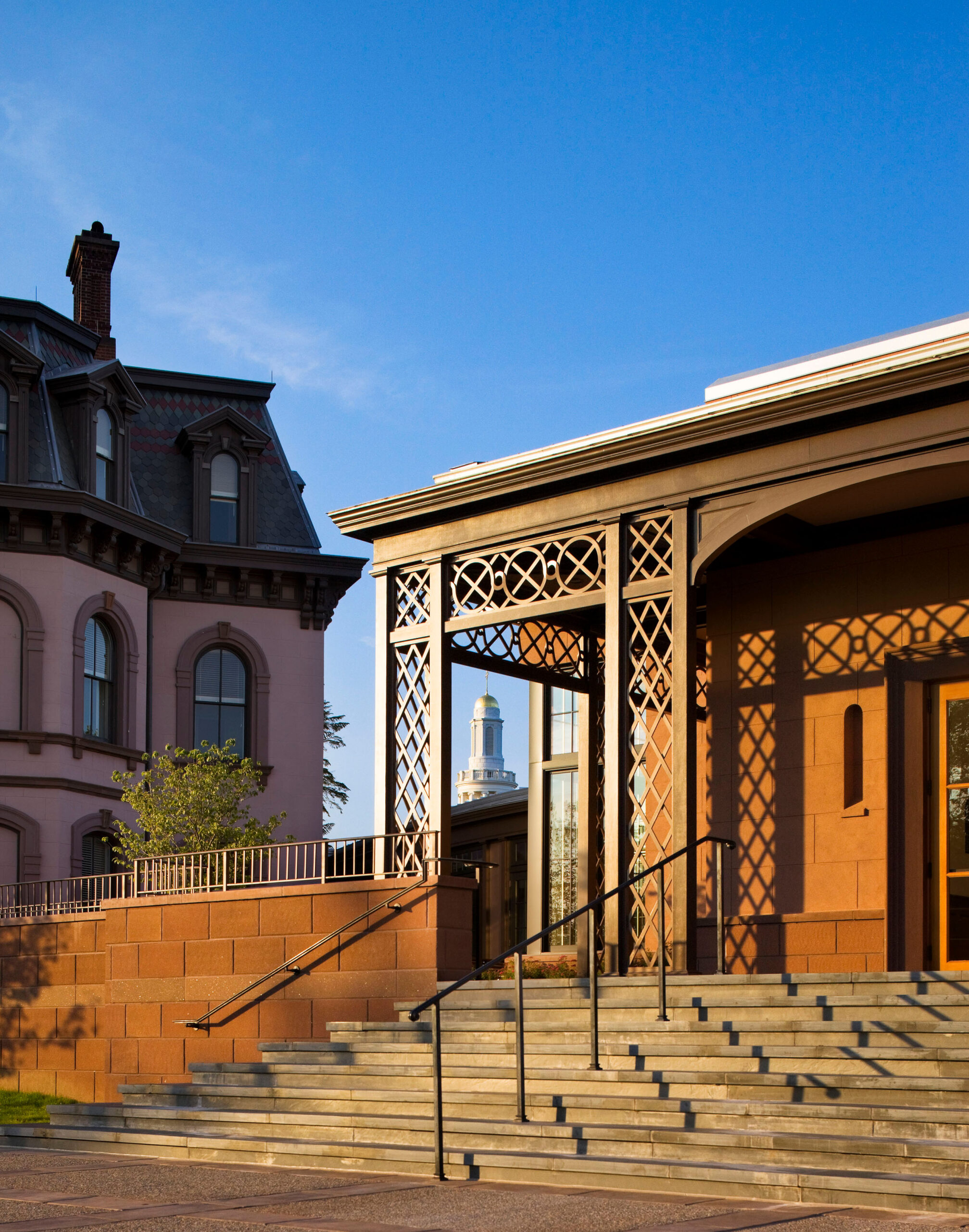 Steps leading into a reddish-tan cement block building