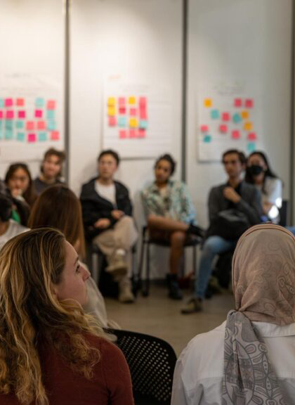 People gathered in a conversation circle