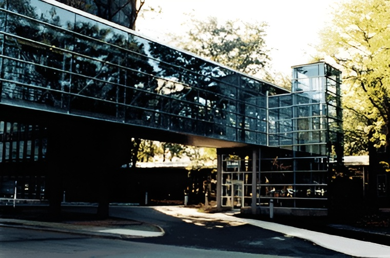 Glass walled walkway bridge