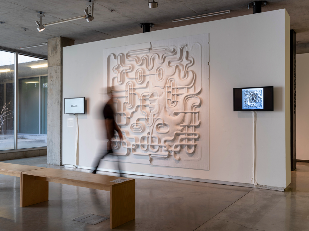 Person walking through a gallery installation