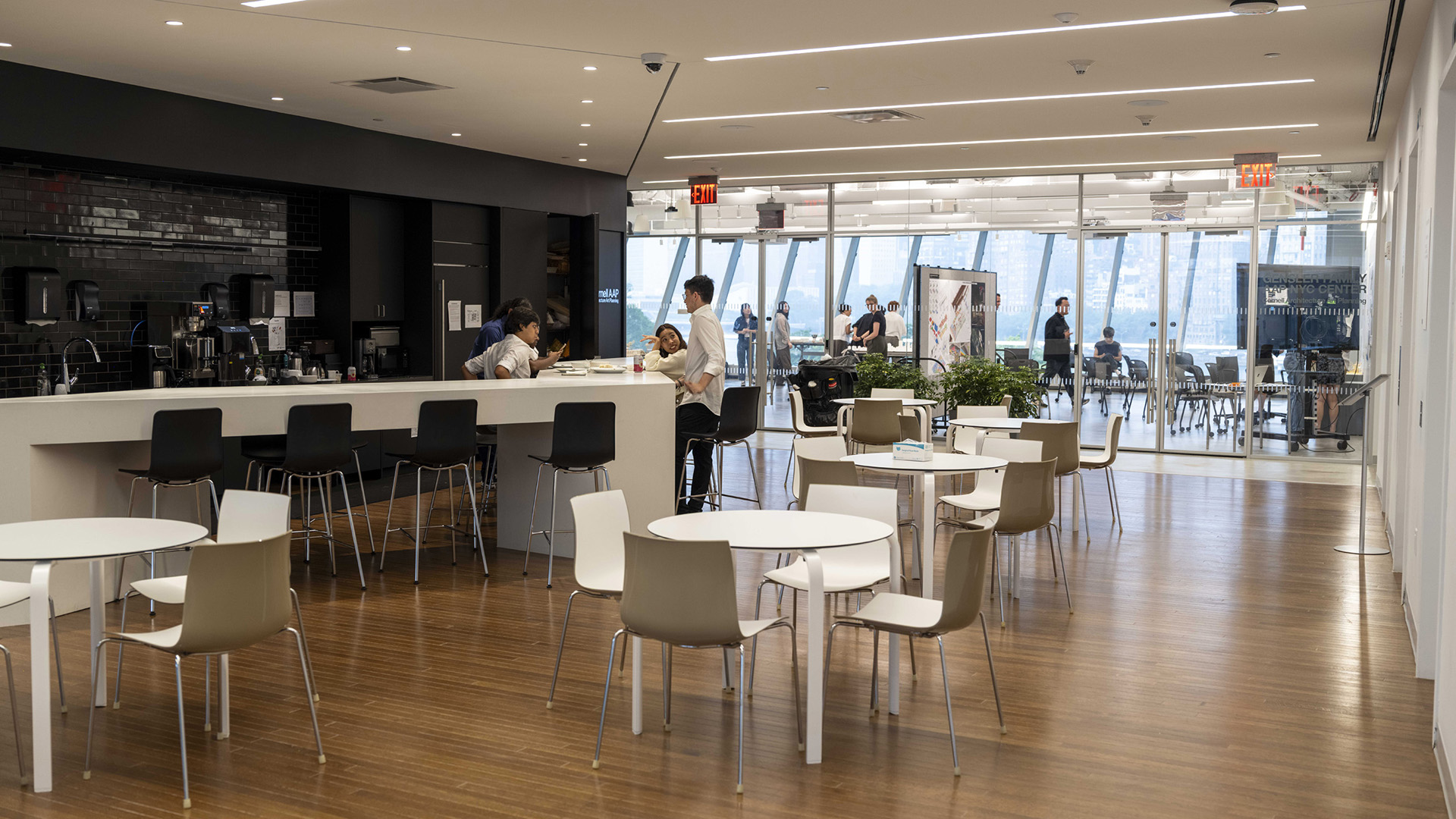 Interior of a lobby and pantry with chairs for eating lunch.