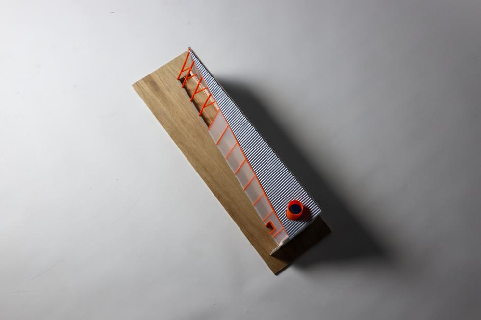 an aerial image of an isosceles triangle shaped building