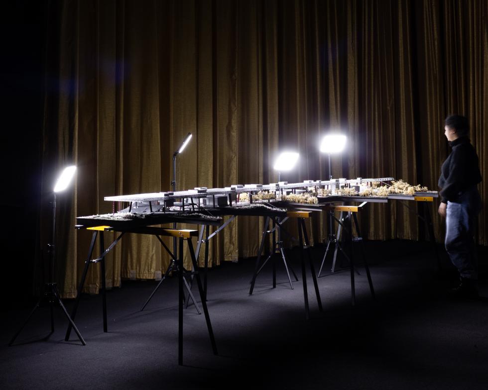 a long architectural model on supports showing truss support