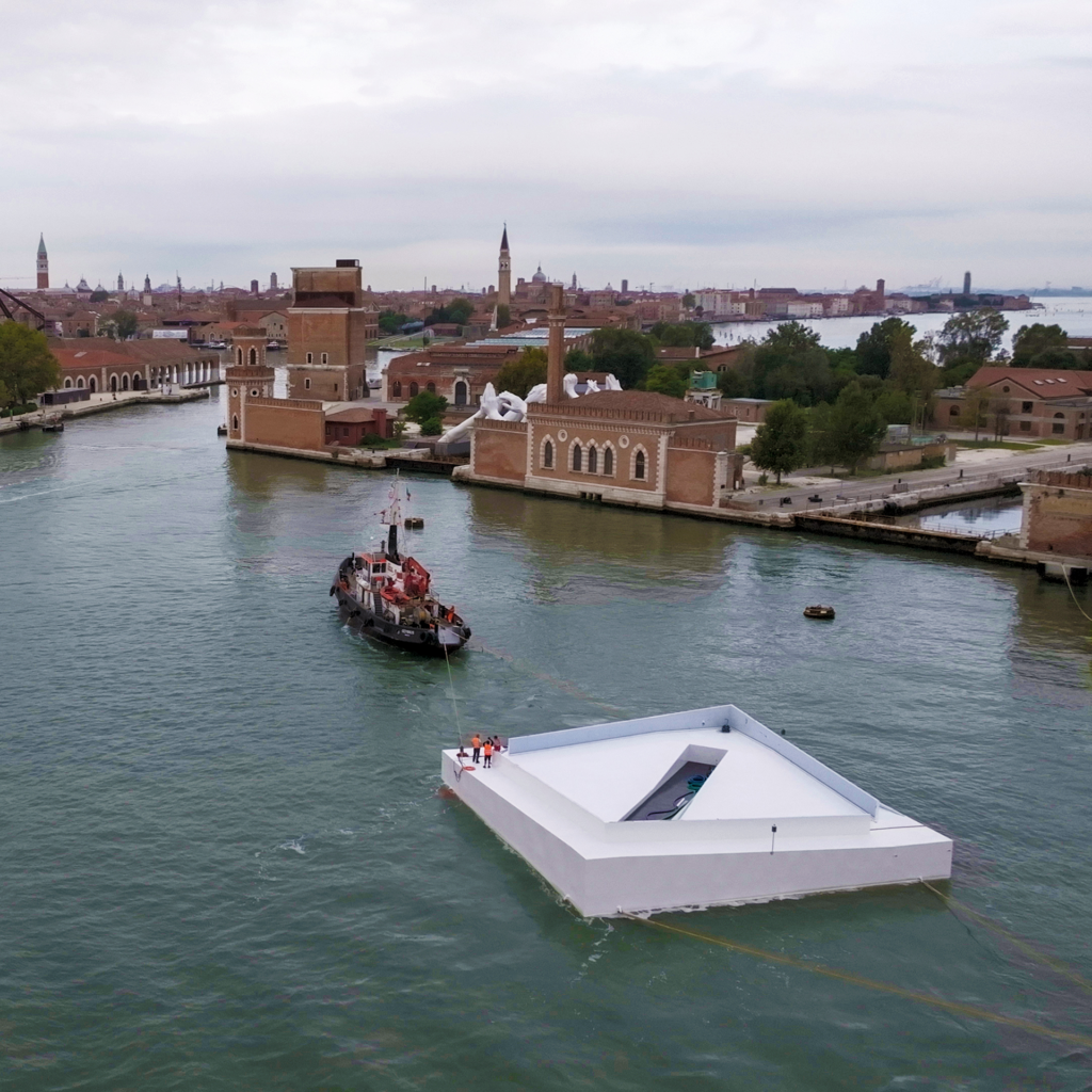 Pavilion floating along a Venice waterway