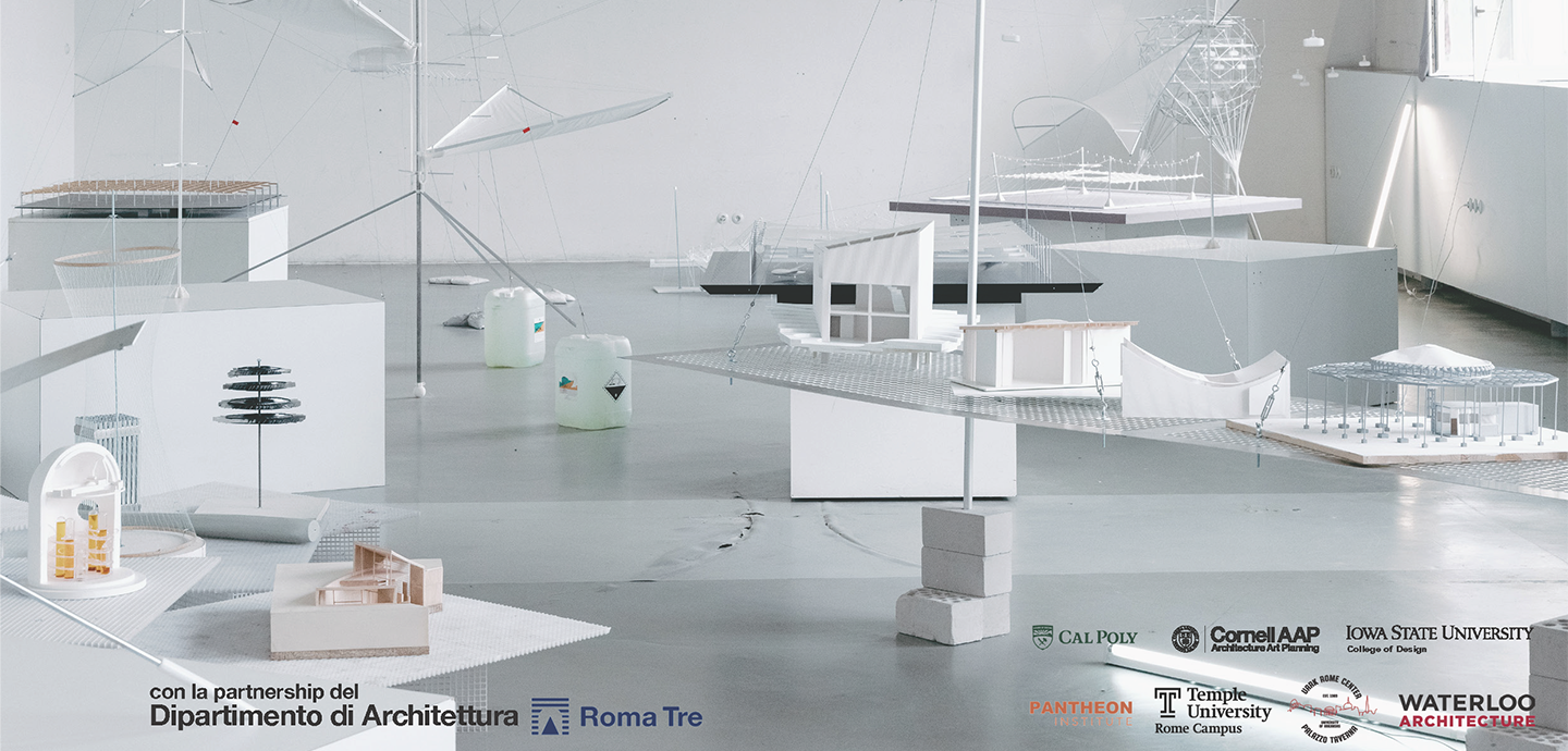 a series of architectural models in a room