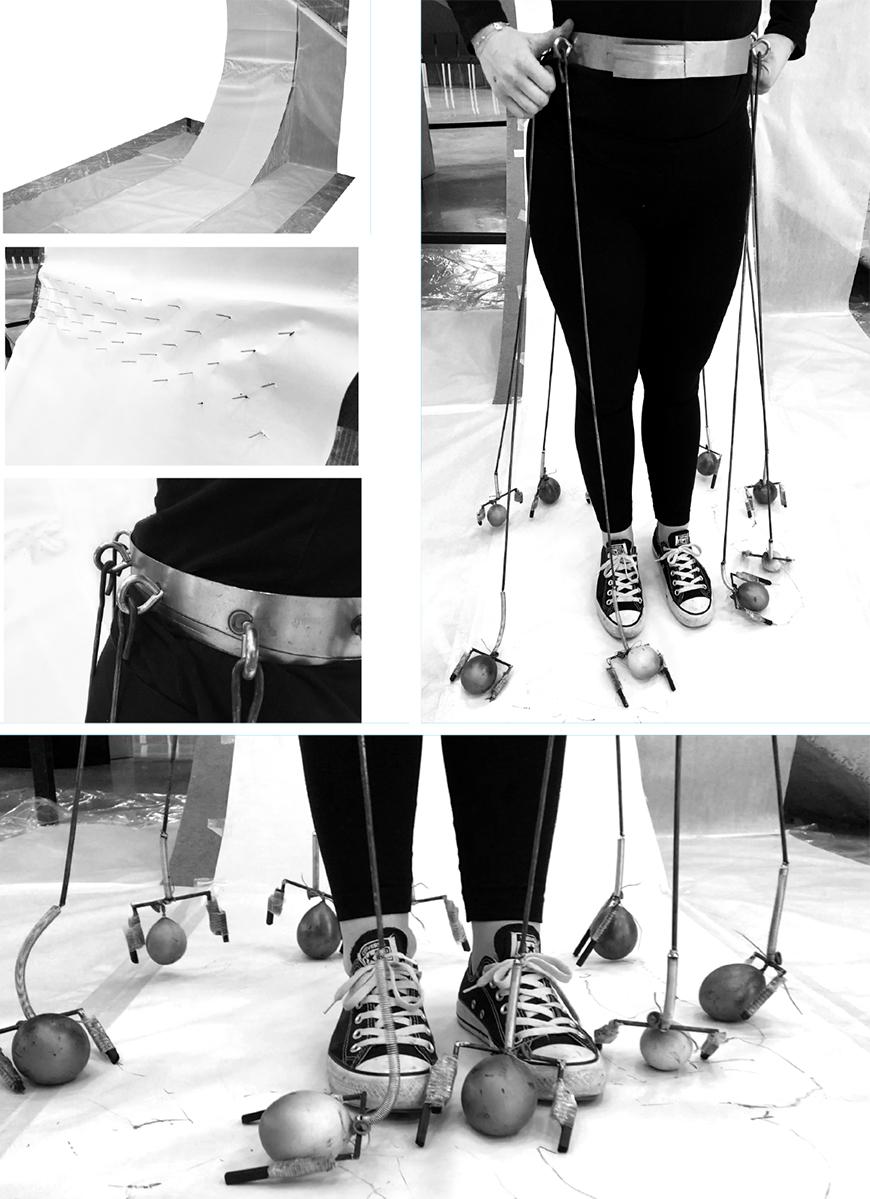 A person in converse shoes with ink-filled balloons attached to their belt with metal cord.