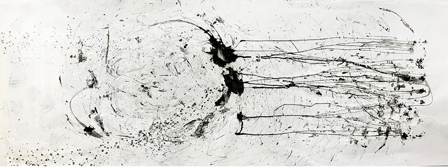 Ink splattered on a large canvas.