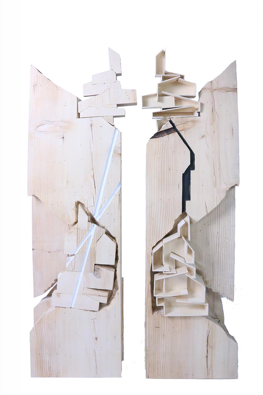 Building model constructed inside and above pieces of 2x4.