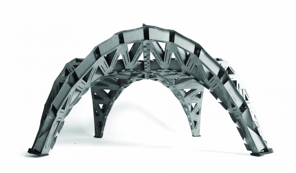 An architectural model that features pronounced arches in a spider-like shape.