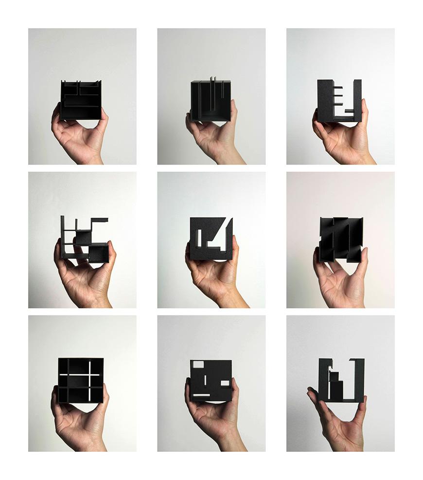 Nine images of a person's hand holding a small black architecture model at various angles.