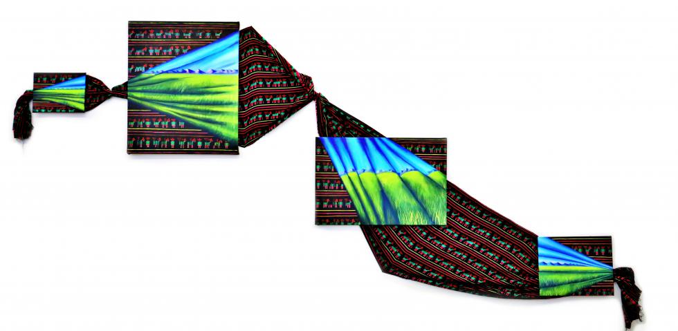 Four canvases are covered in cloth and connected to each other.