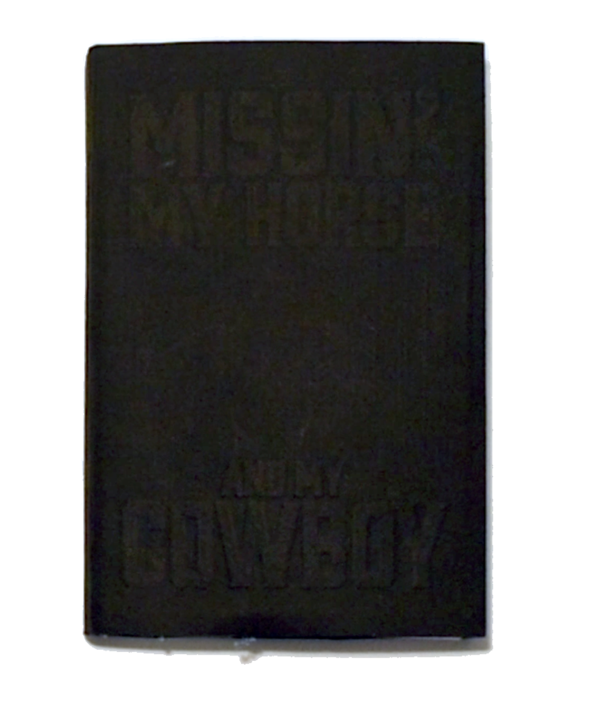 Book cover with embossed text.